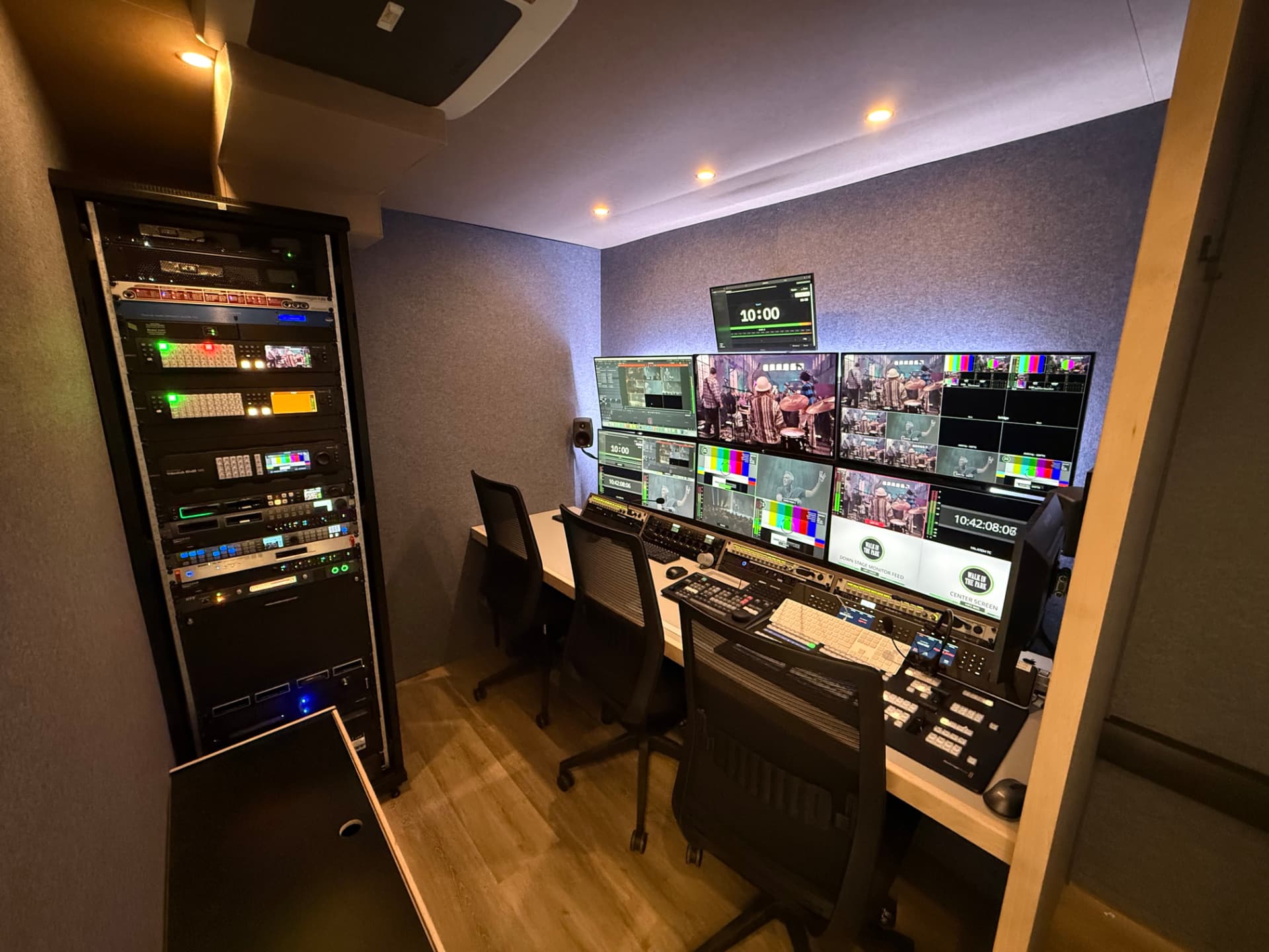 OB van production control area with multiple monitors