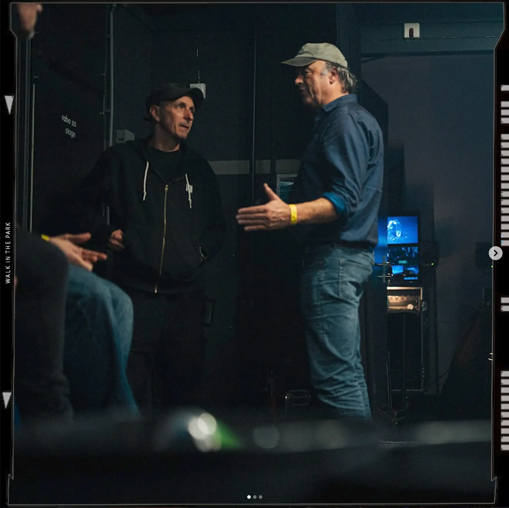 Director and crew talking backstage before the show