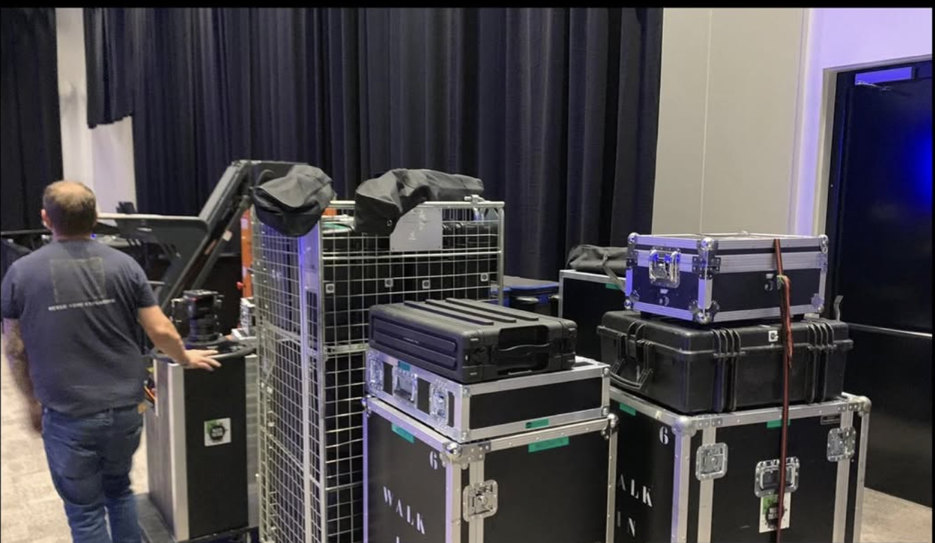 Load-in — flightcases and camera gear ready on site