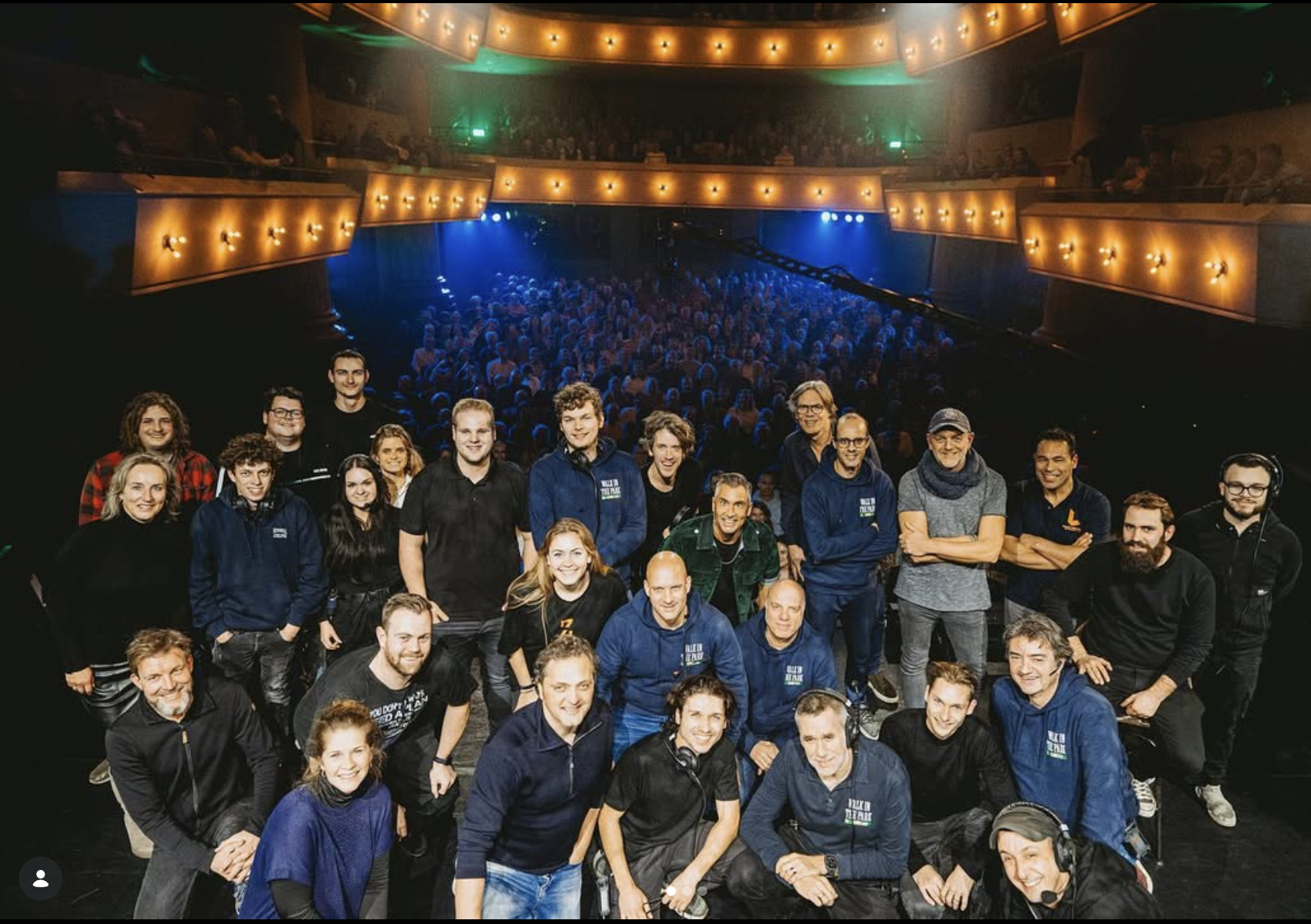 Walk in the Park crew on stage in a theater