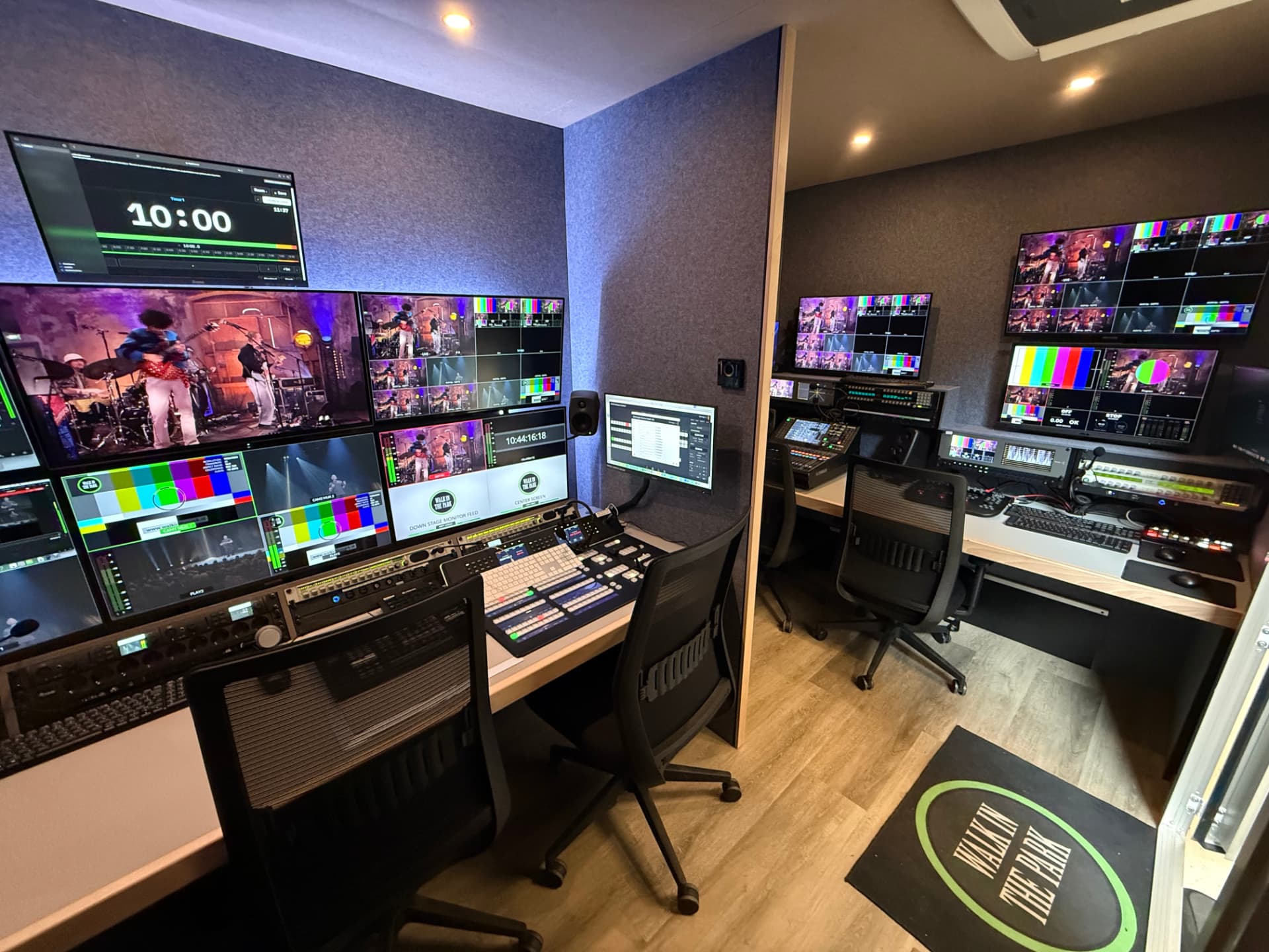 OB van interior with production desk and multiview screens